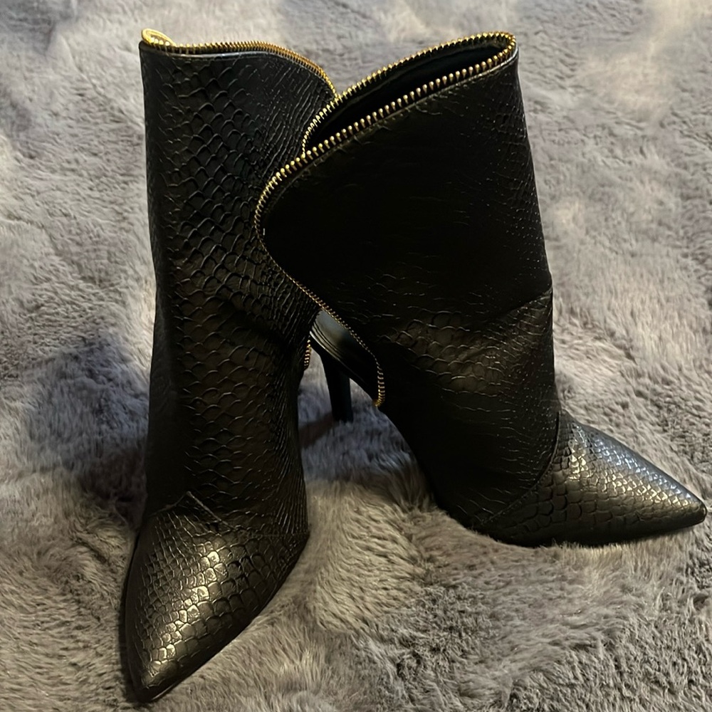 Black slide on mid boots